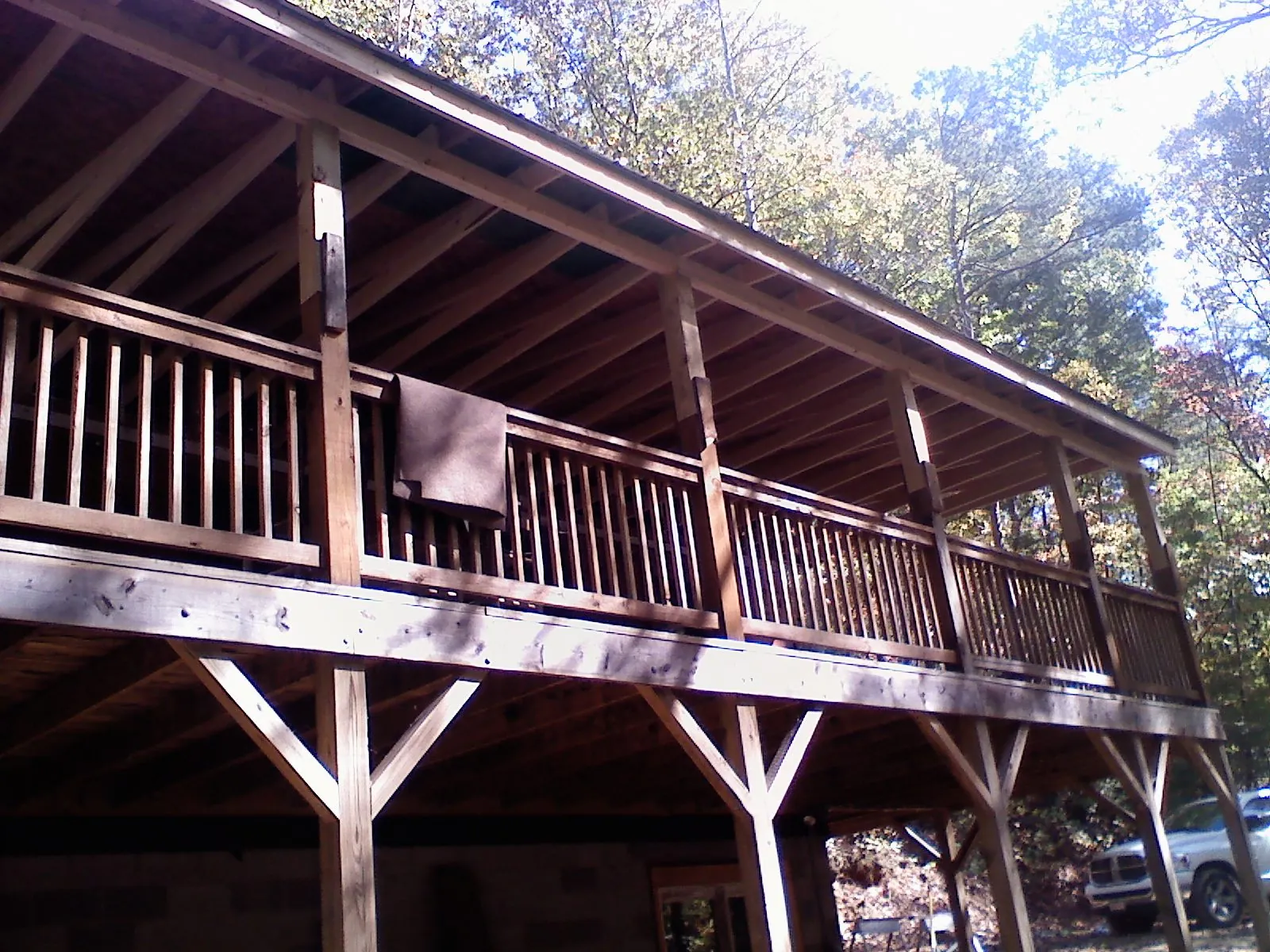 Timber framing under a new elevated porch and deck — Roof Leak Repair in Port Saint Lucie by Roofing Brothers
